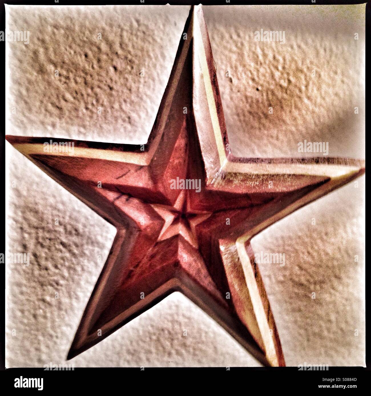 A wooden star. - Smartphone Captured Stock Image