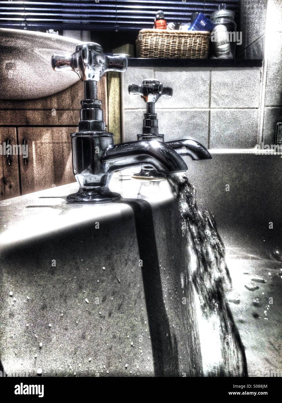 Running a bath in a bathroom Stock Photo Alamy