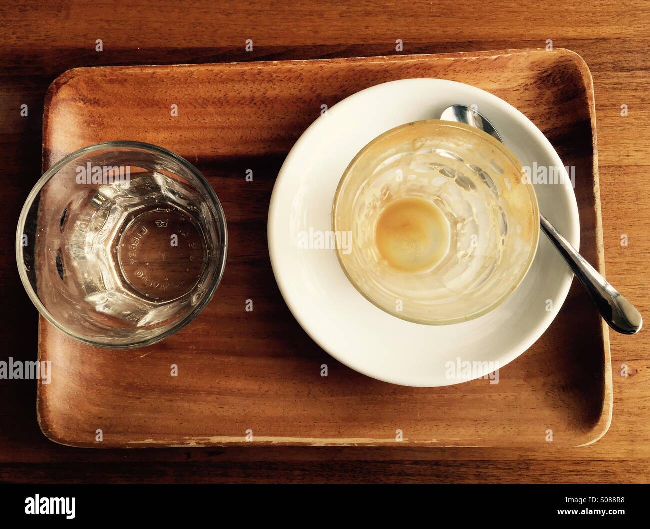 Empty and full cups Stock Photo Alamy