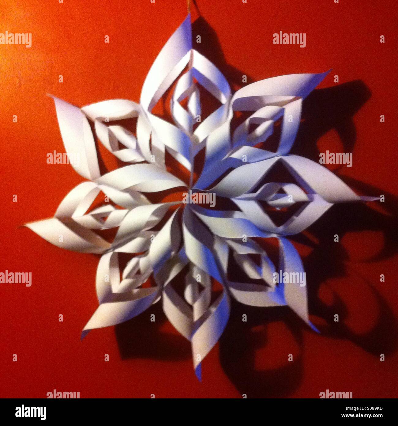 Home made paper Christmas star decoration - Smartphone Captured Stock Image
