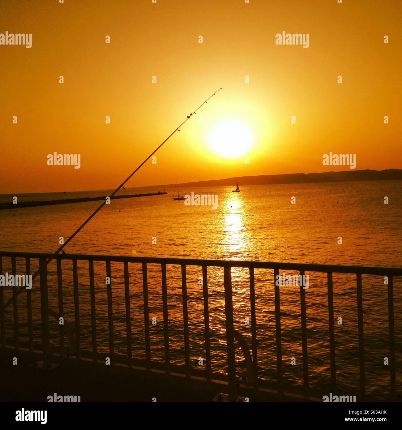 Fishhook, sunset,sunrise Stock Photo