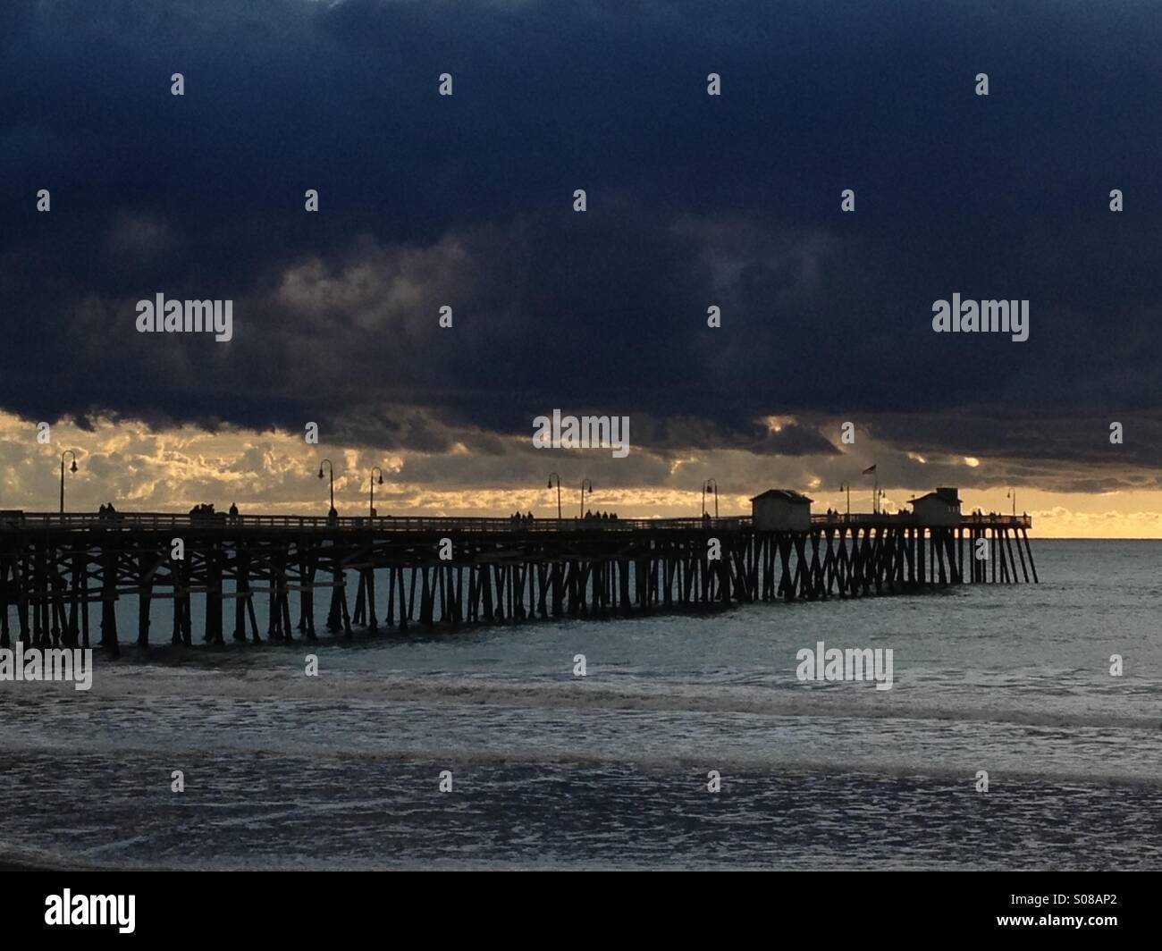 San Clemente pier at sunset after a passing storm, California USA. Stock Photo