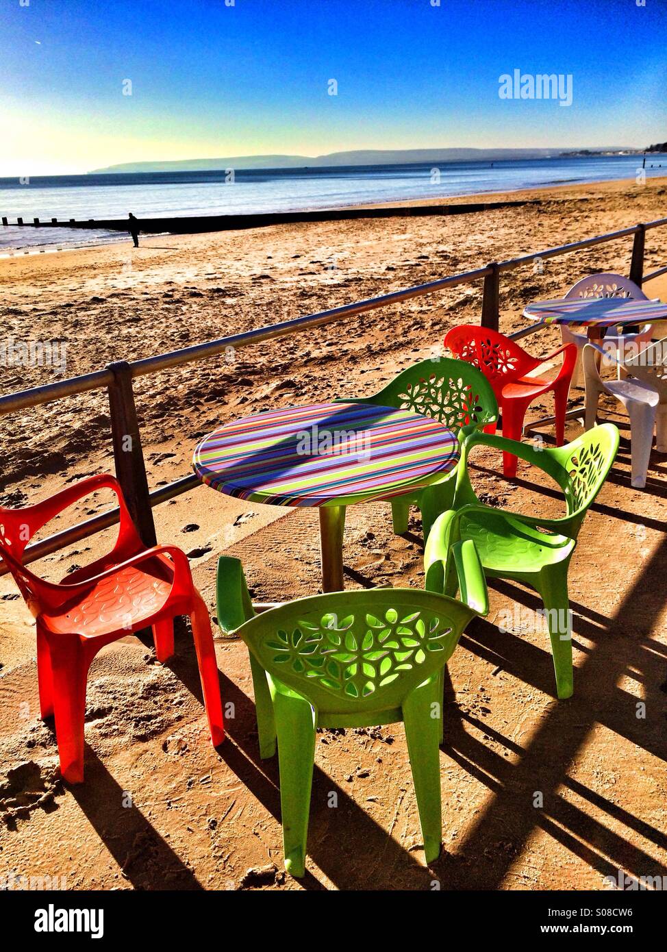 Table and chairs at Bournemouth beach Stock Photo Alamy