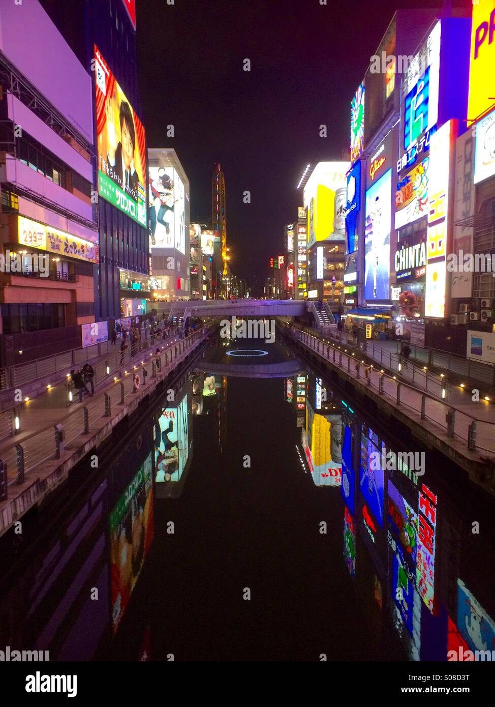 Dotonbori district at night, colorful neon signs, Chuo-ko, Osaka, Japan - Smartphone Captured Stock Image Dotonbori district at night, colorful neon signs, Chuo-ko, Osaka, Japan - Smartphone Captured Stock Image