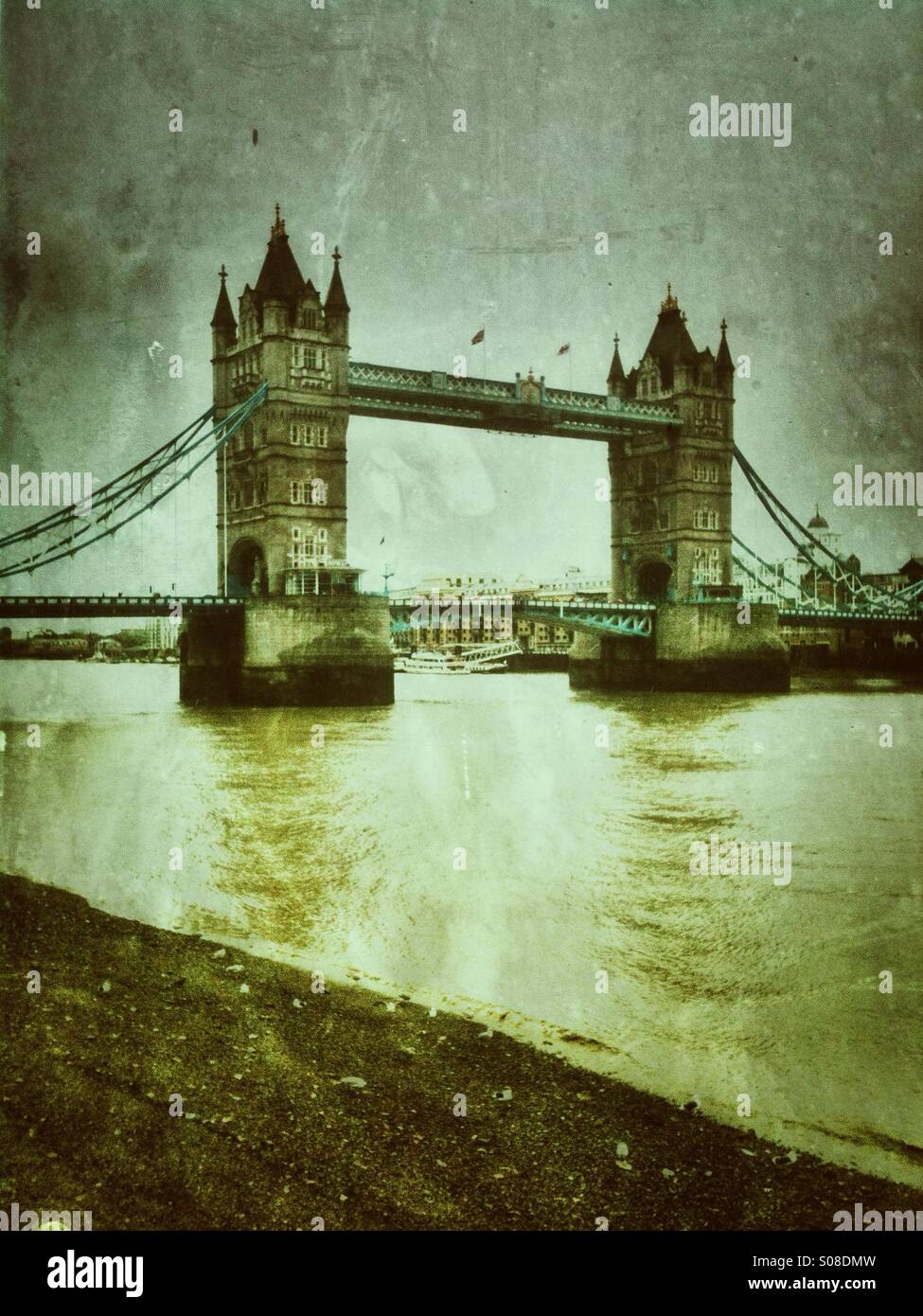 Tower Bridge in London UK. Grunge effect applied. - Smartphone Captured Stock Image