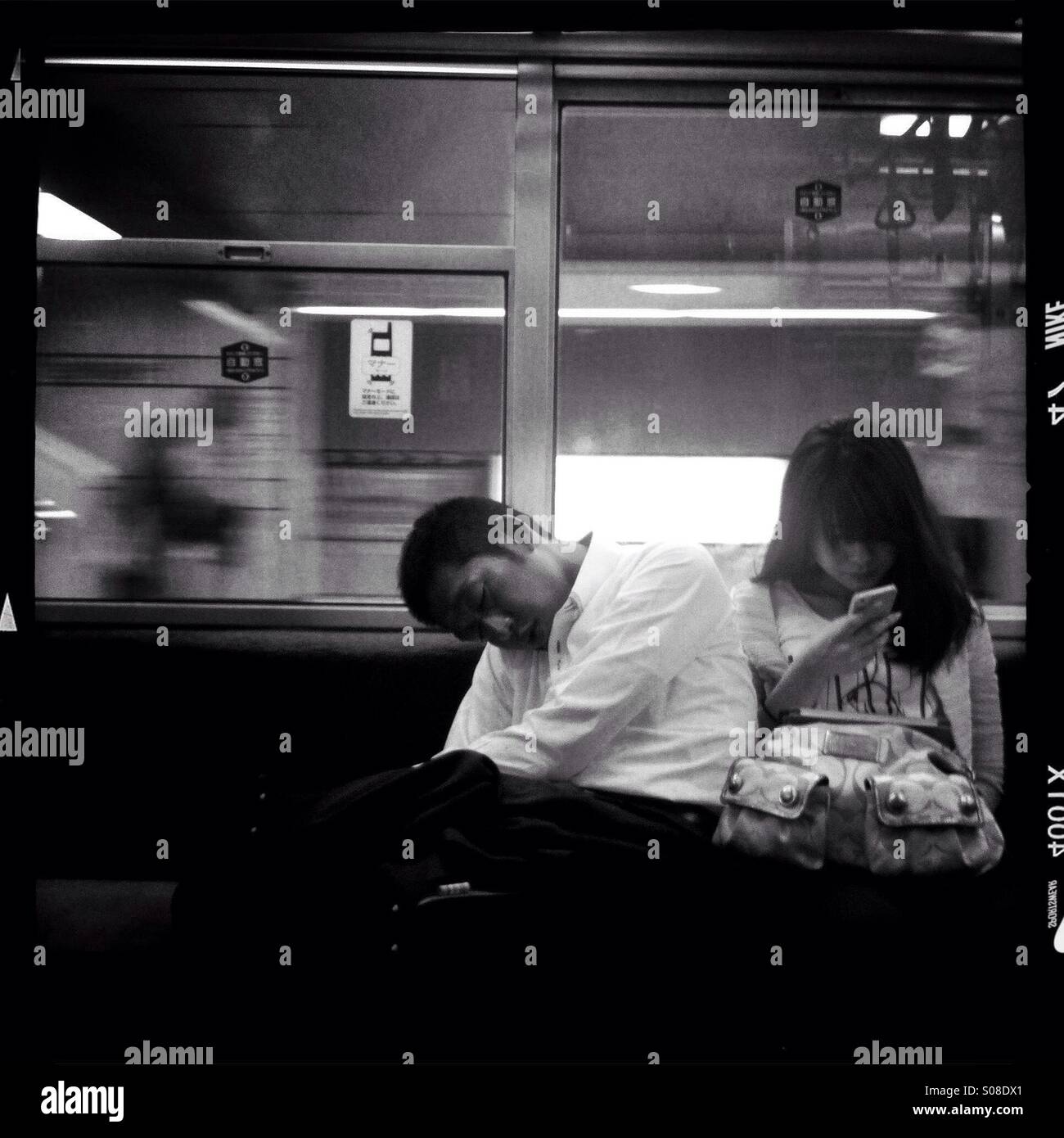 Passengers sleep on train in hi-res stock photography and images - Alamy