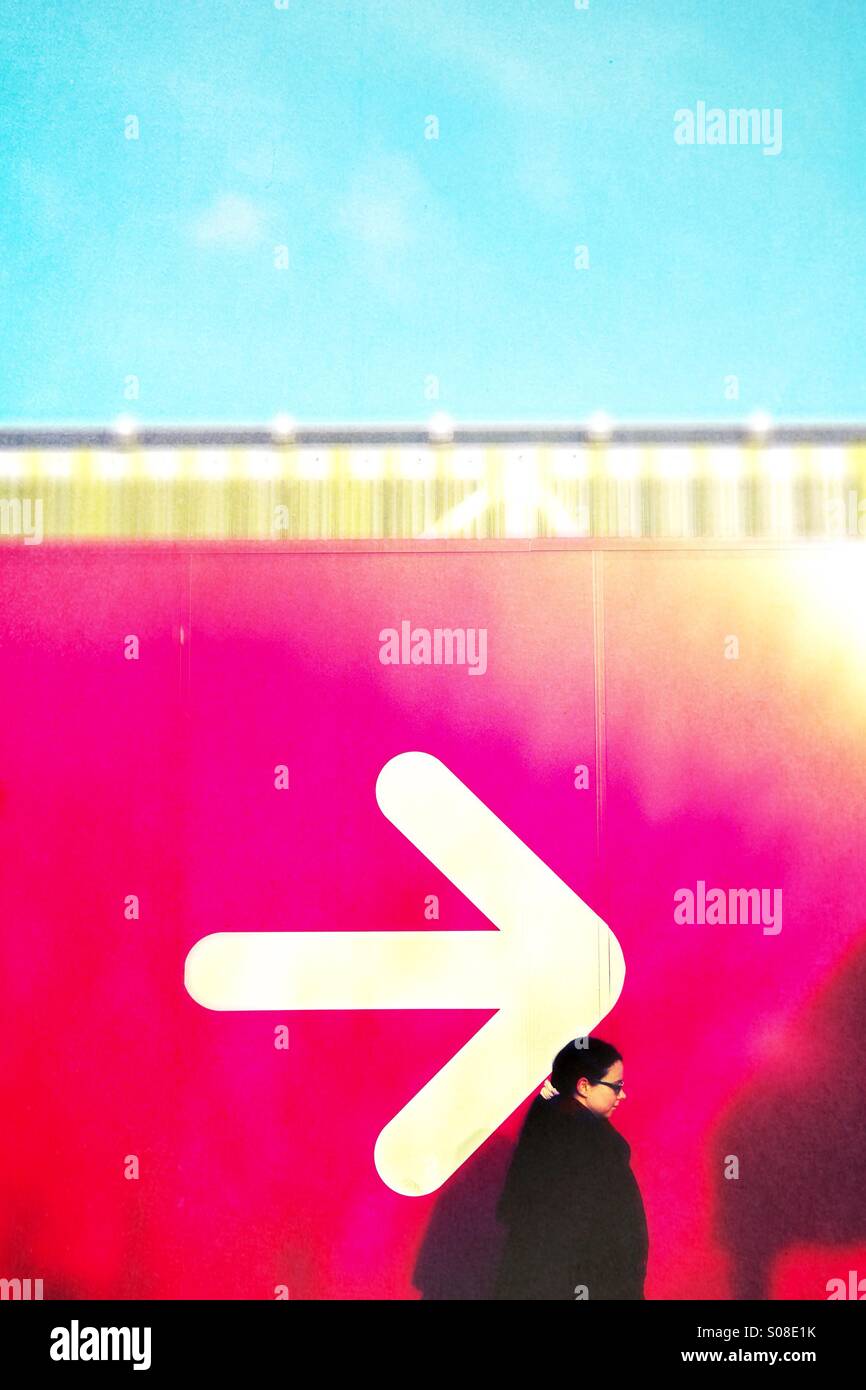 This way only - direction arrow sign - Smartphone Captured Stock Image
