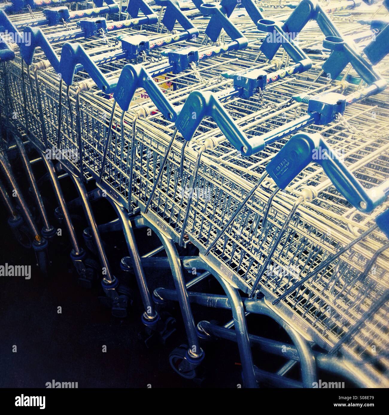 Shopping trolleys - supermarket trolleys Stock Photo