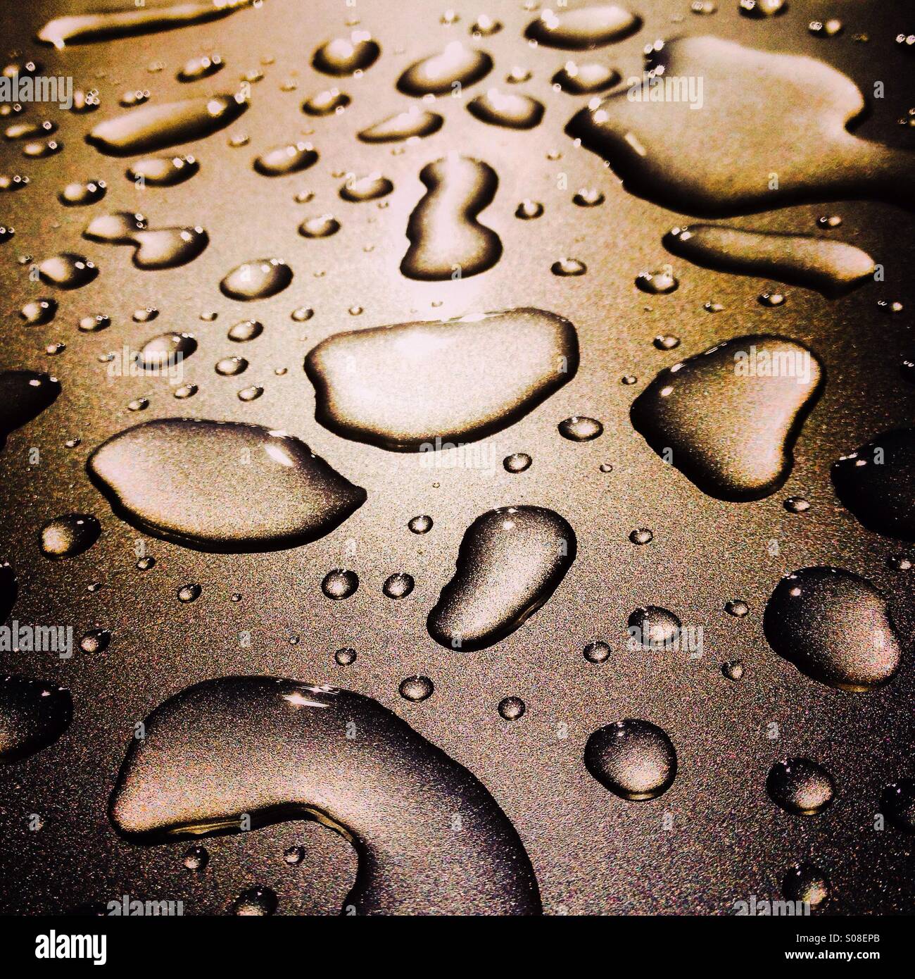 Water droplets on a silver vehicle - Smartphone Captured Stock Image
