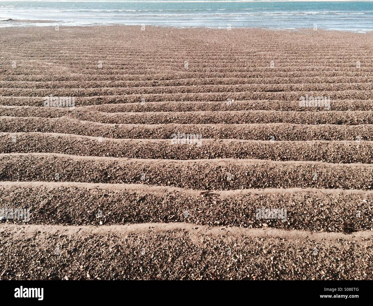 Ripples on Saleen beach in County Waterford, Ireland. - Smartphone Captured Stock Image