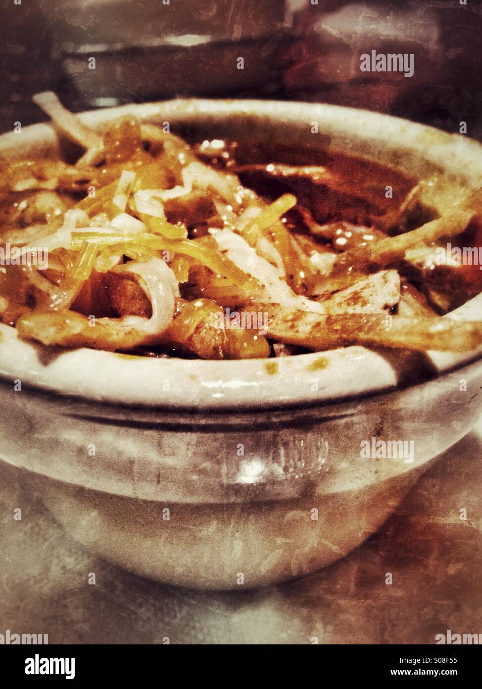 A hot bowl of chicken tortilla soup. - Smartphone Captured Stock Image