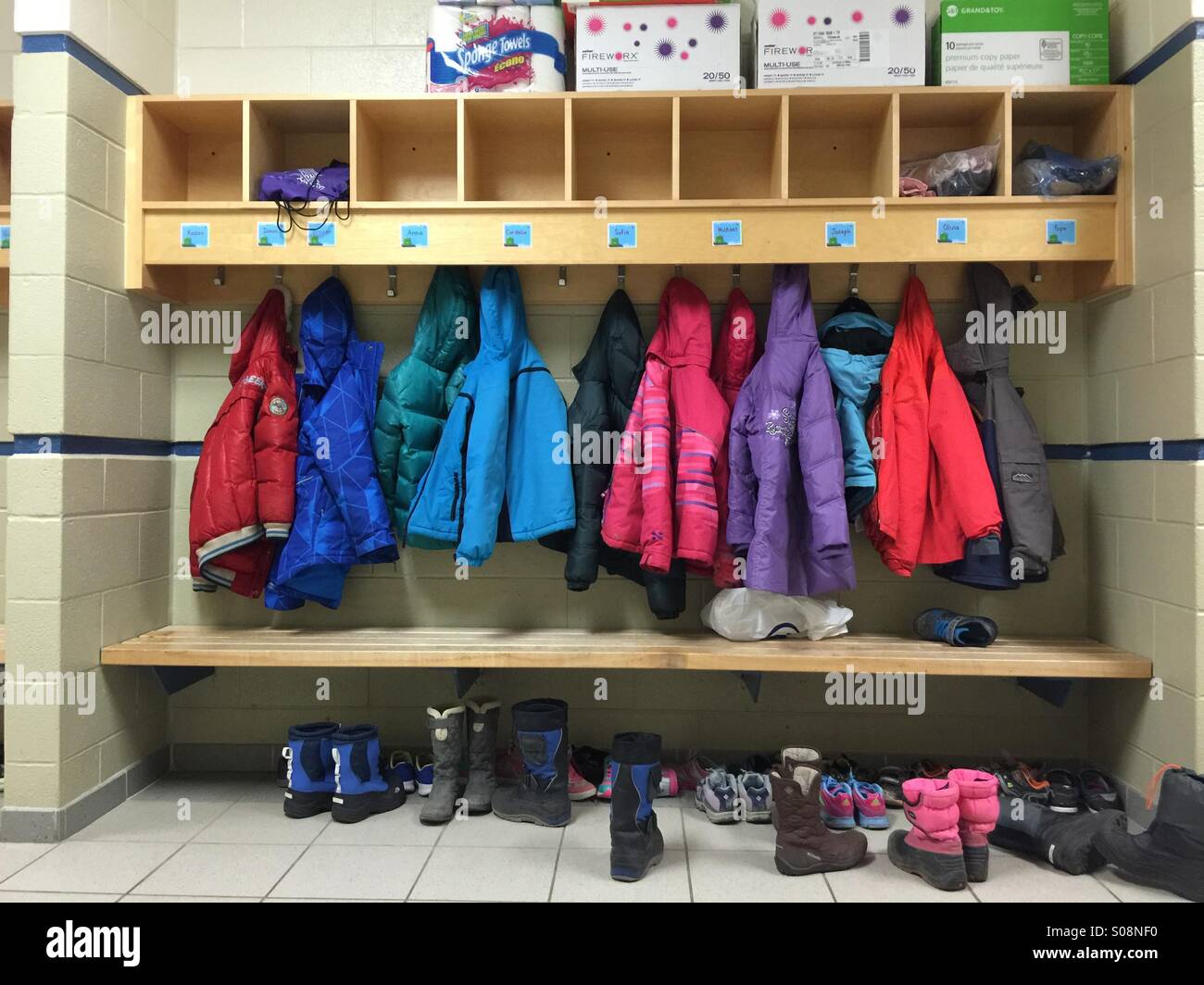Kids storage at school Stock Photo - Alamy