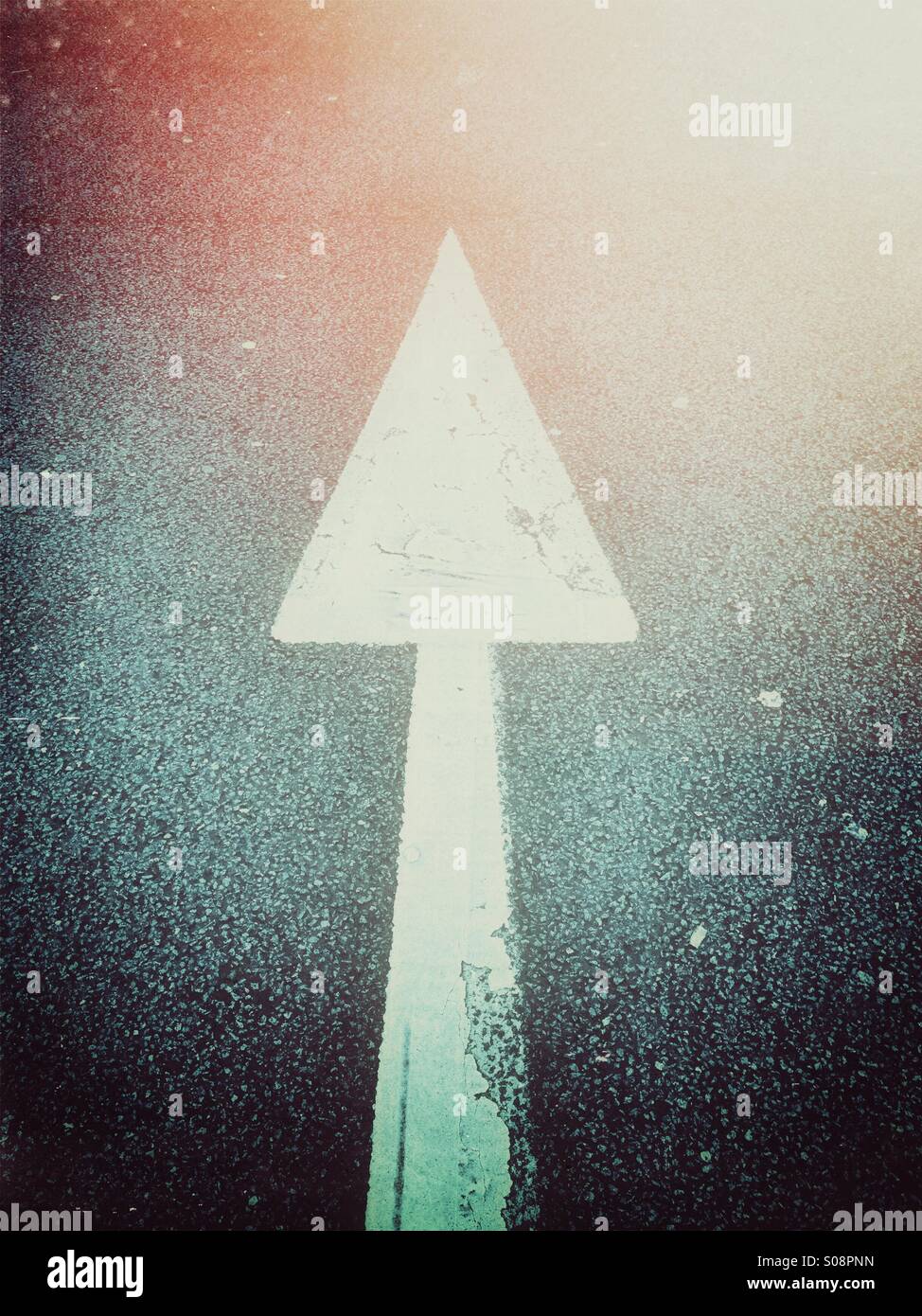 Direction arrow on asphalt - Smartphone Captured Stock Image