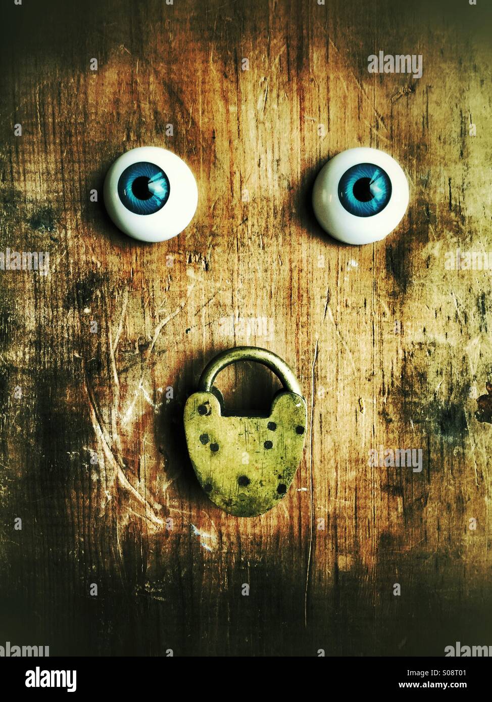 Eyes and a padlock Stock Photo Alamy