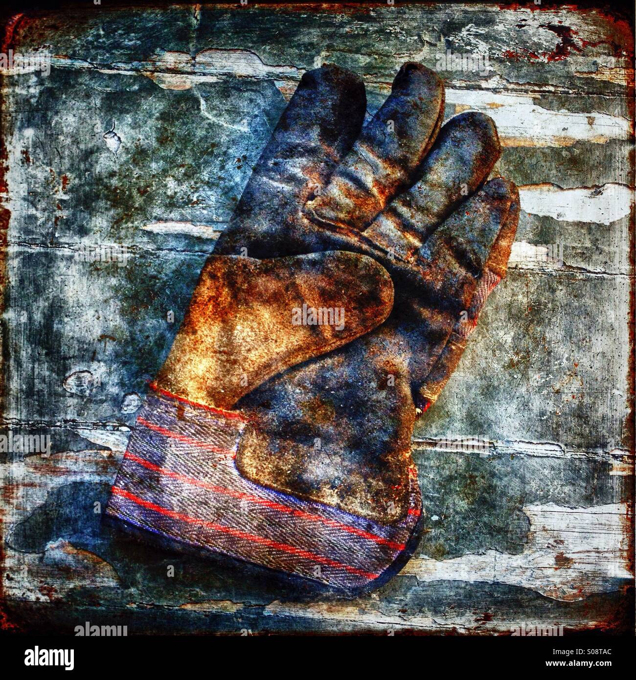 An old leather work glove. Stock Photo