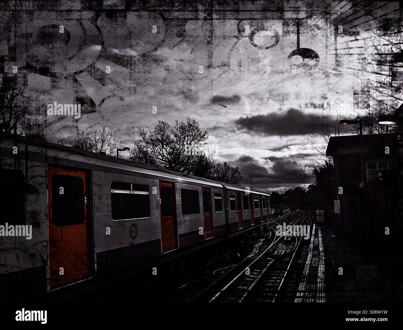 Tube train and tracks, London, UK Stock Photo