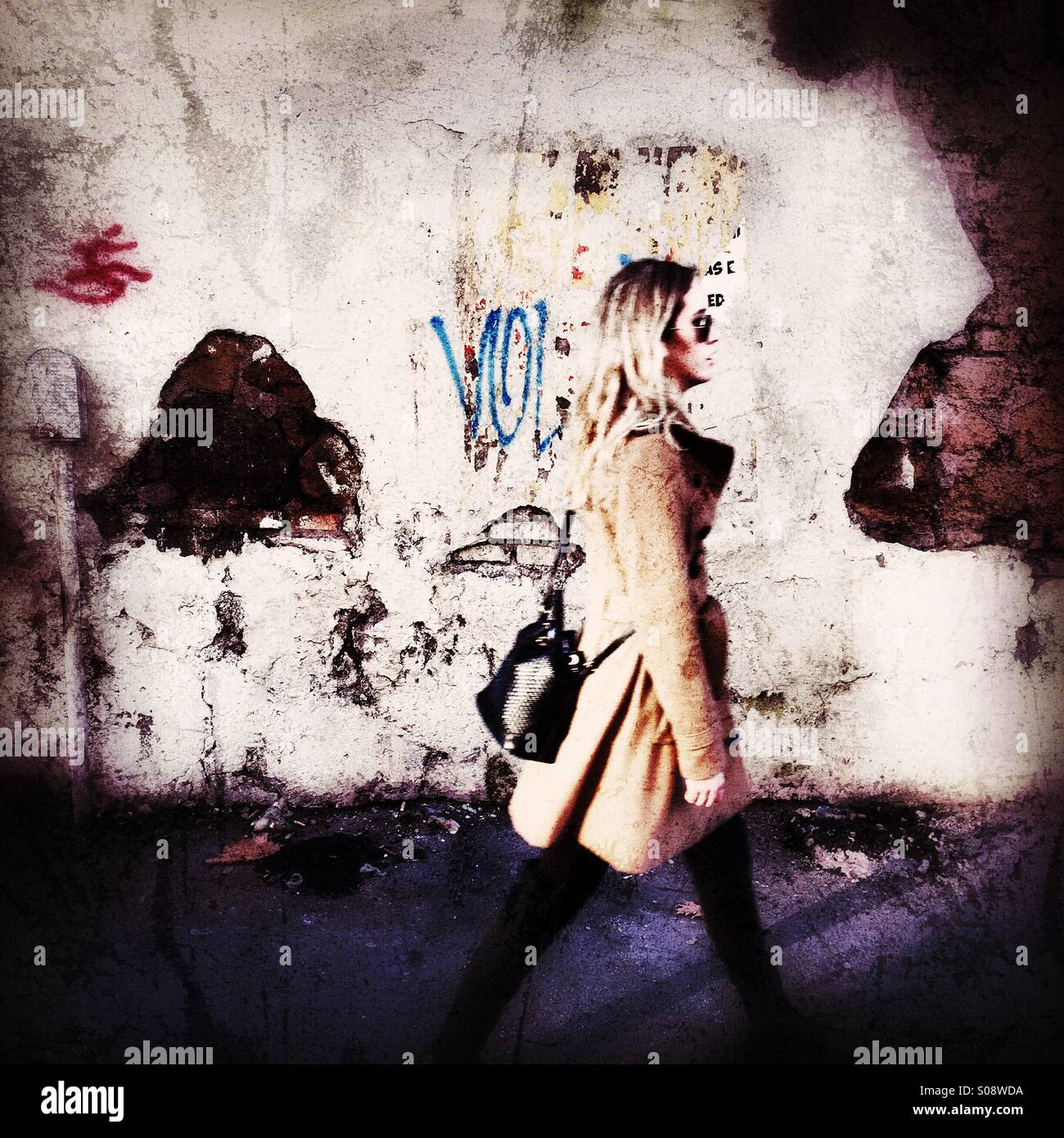 Girl in front of graffiti wall - Smartphone Captured Stock Image