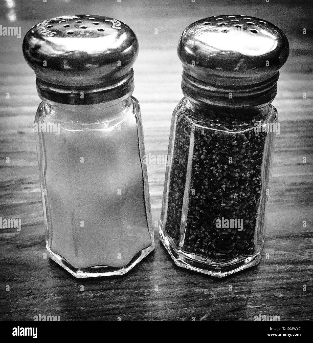 Salt & pepper shakers at a resturaunt Stock Photo Alamy