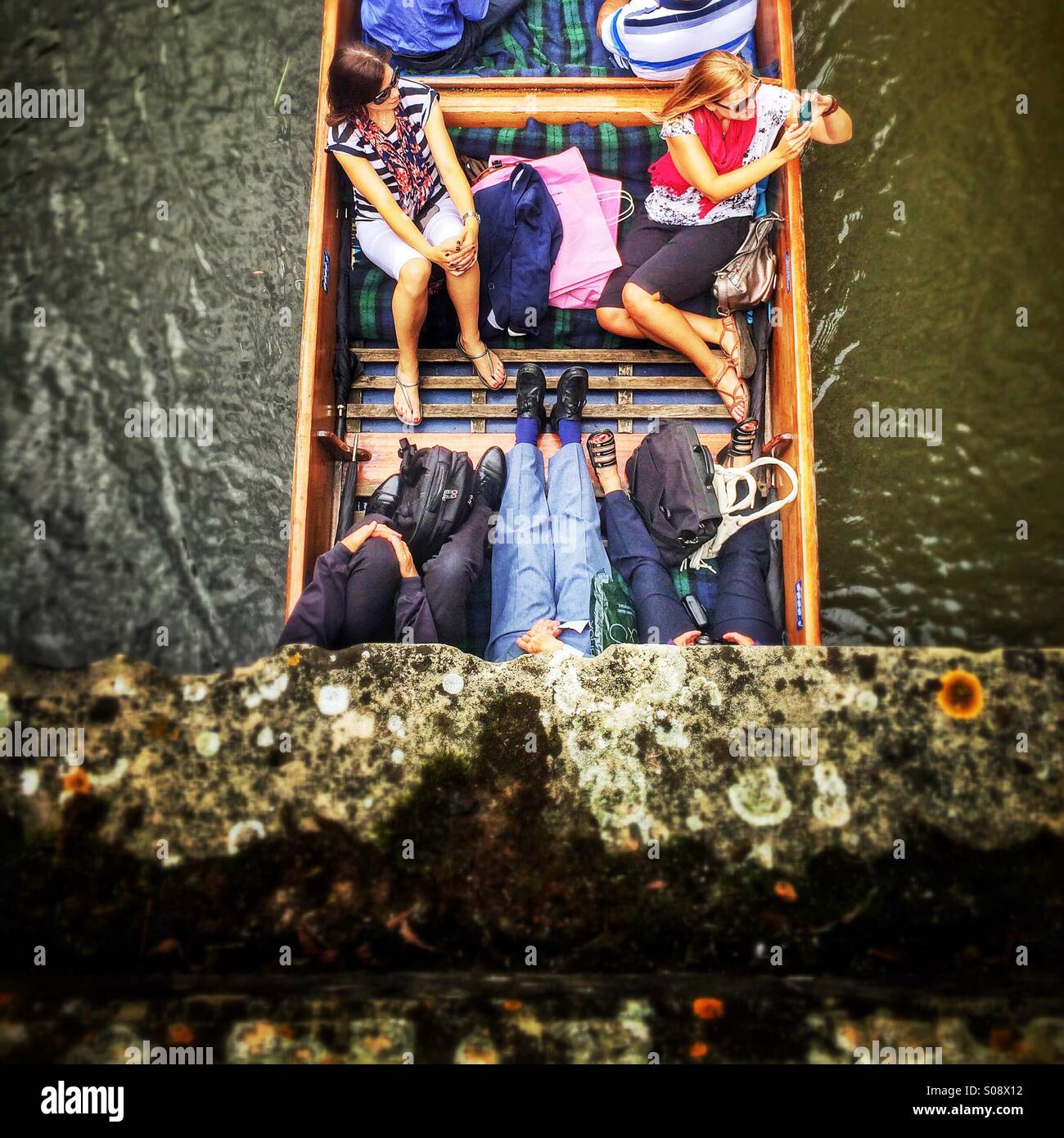 People punting on the River Cam, seen from a bridge, Cambridge, UK - Smartphone Captured Stock Image