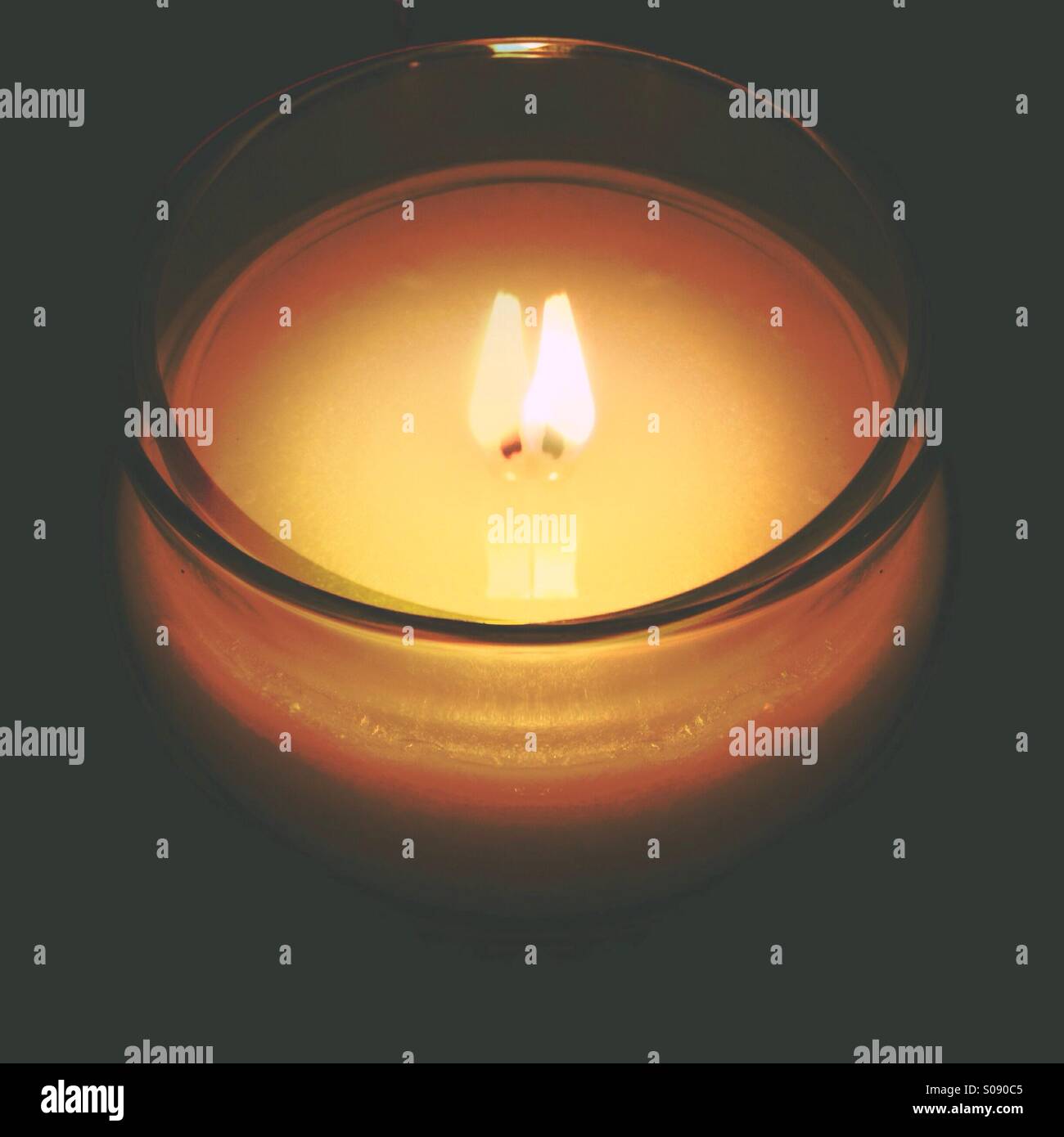 Candle with double flame (effect Stock Photo Alamy