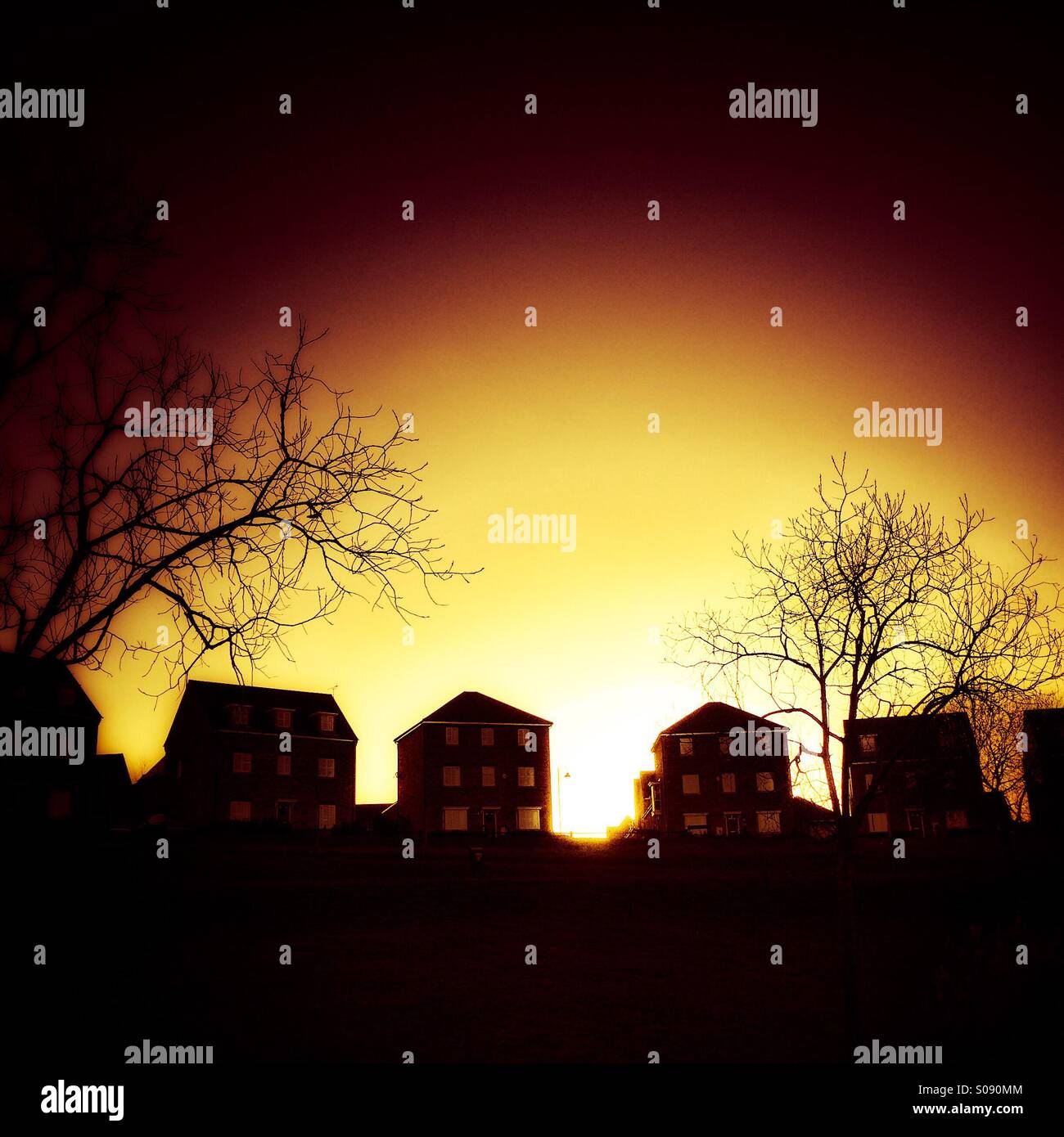 Sunset in between houses - Smartphone Captured Stock Image