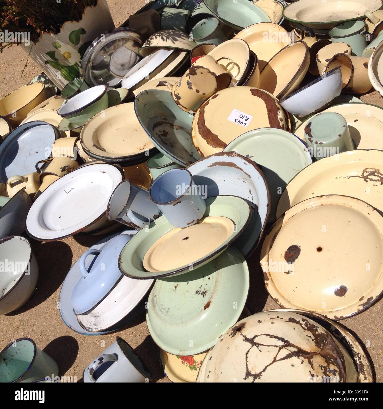 Vintage enamelware for sale Stock Photo Alamy