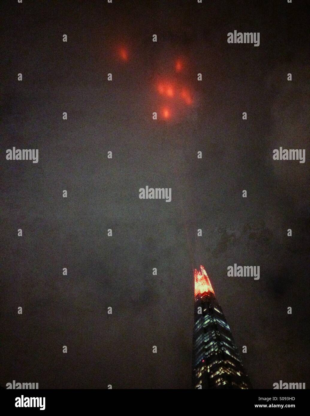 The Shard in London shining lights up to the sky. - Smartphone Captured Stock Image The Shard in London shining lights up to the sky. - Smartphone Captured Stock Image