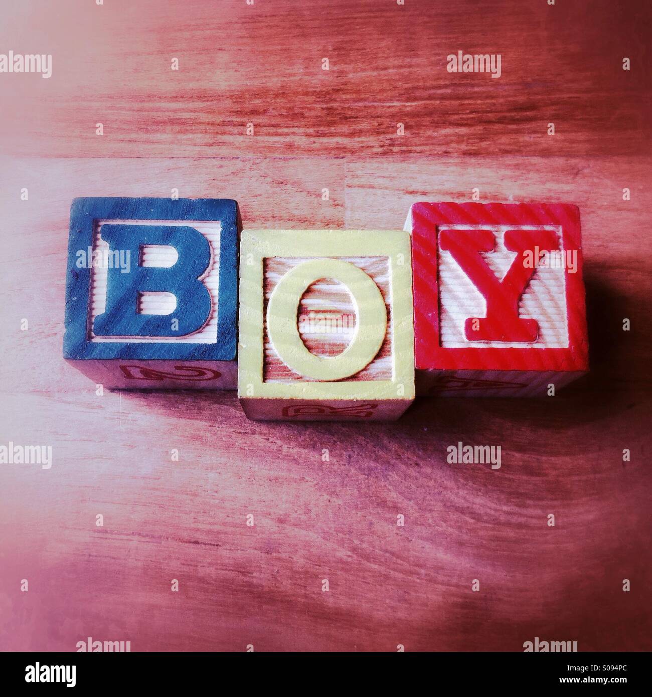Boy written in wooden alphabet blocks - Smartphone Captured Stock Image