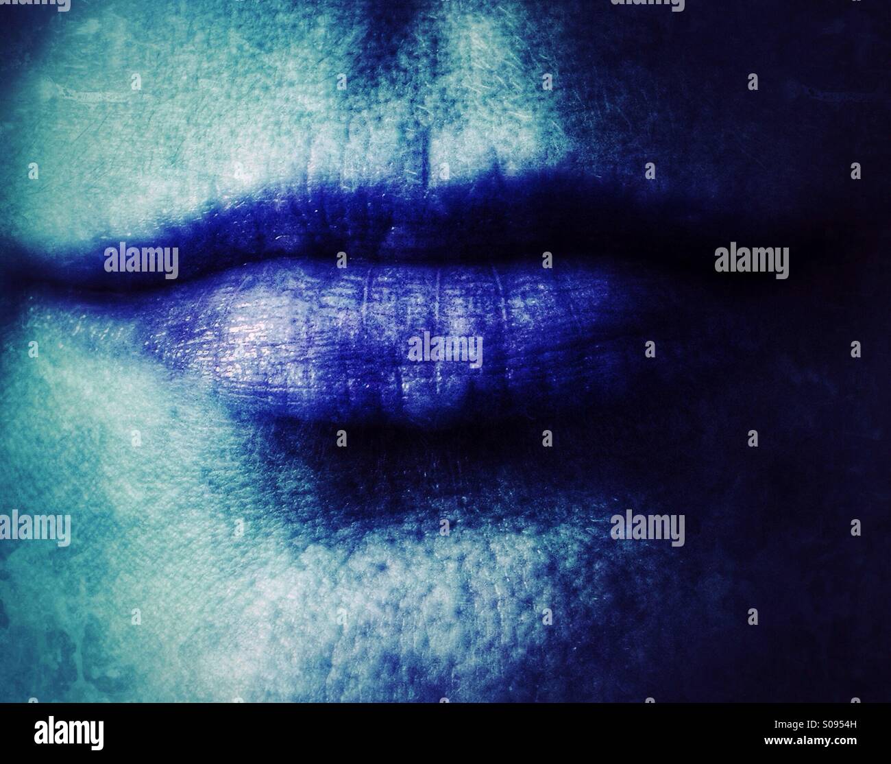 Slight grin (blue). - Smartphone Captured Stock Image