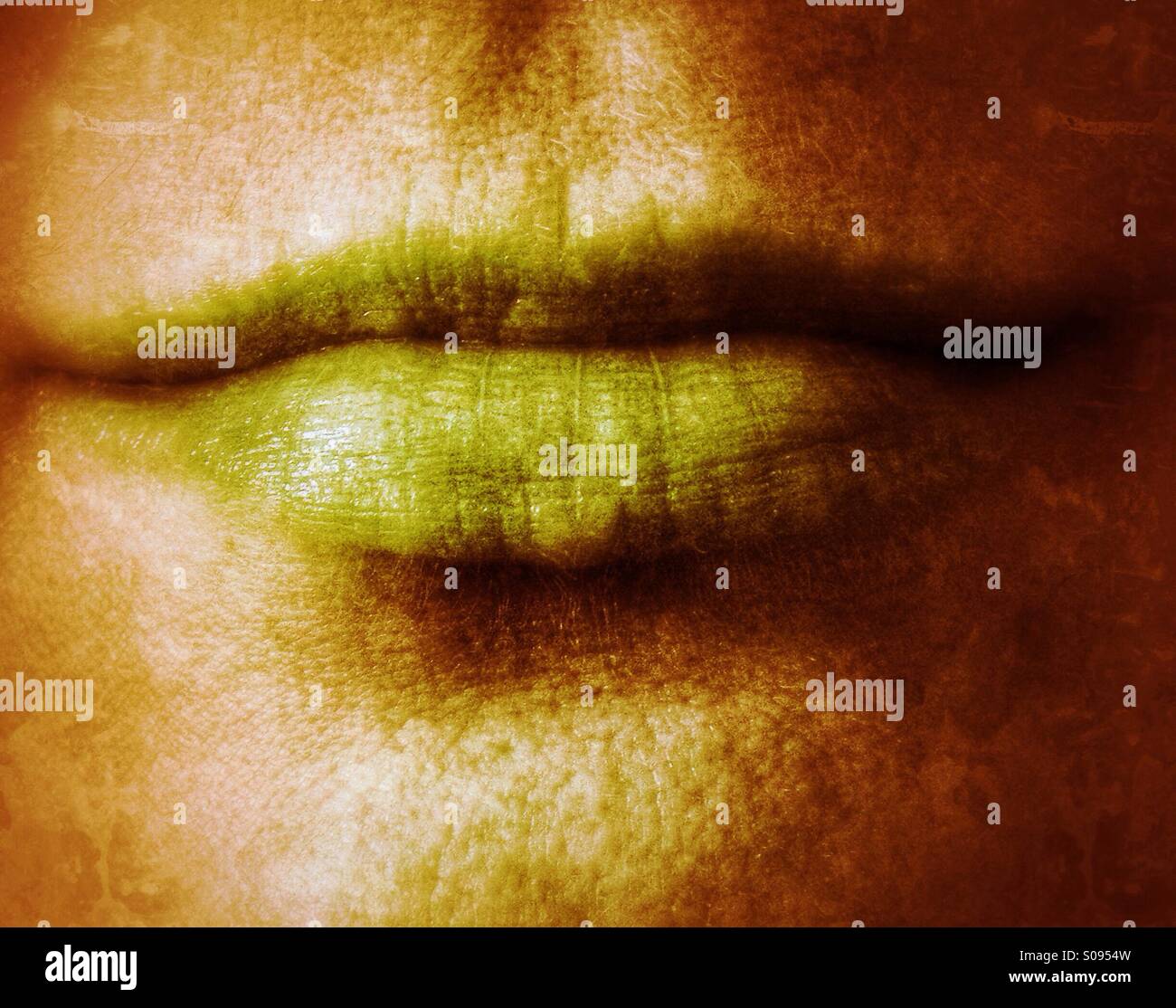 Slight grin (green). - Smartphone Captured Stock Image