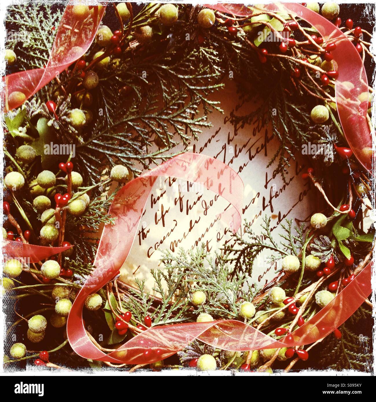 Christmas wreath on old handwriting - Smartphone Captured Stock Image