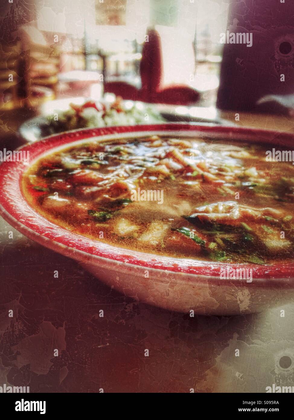 Chicken soup at a Mexican restaurant. - Smartphone Captured Stock Image