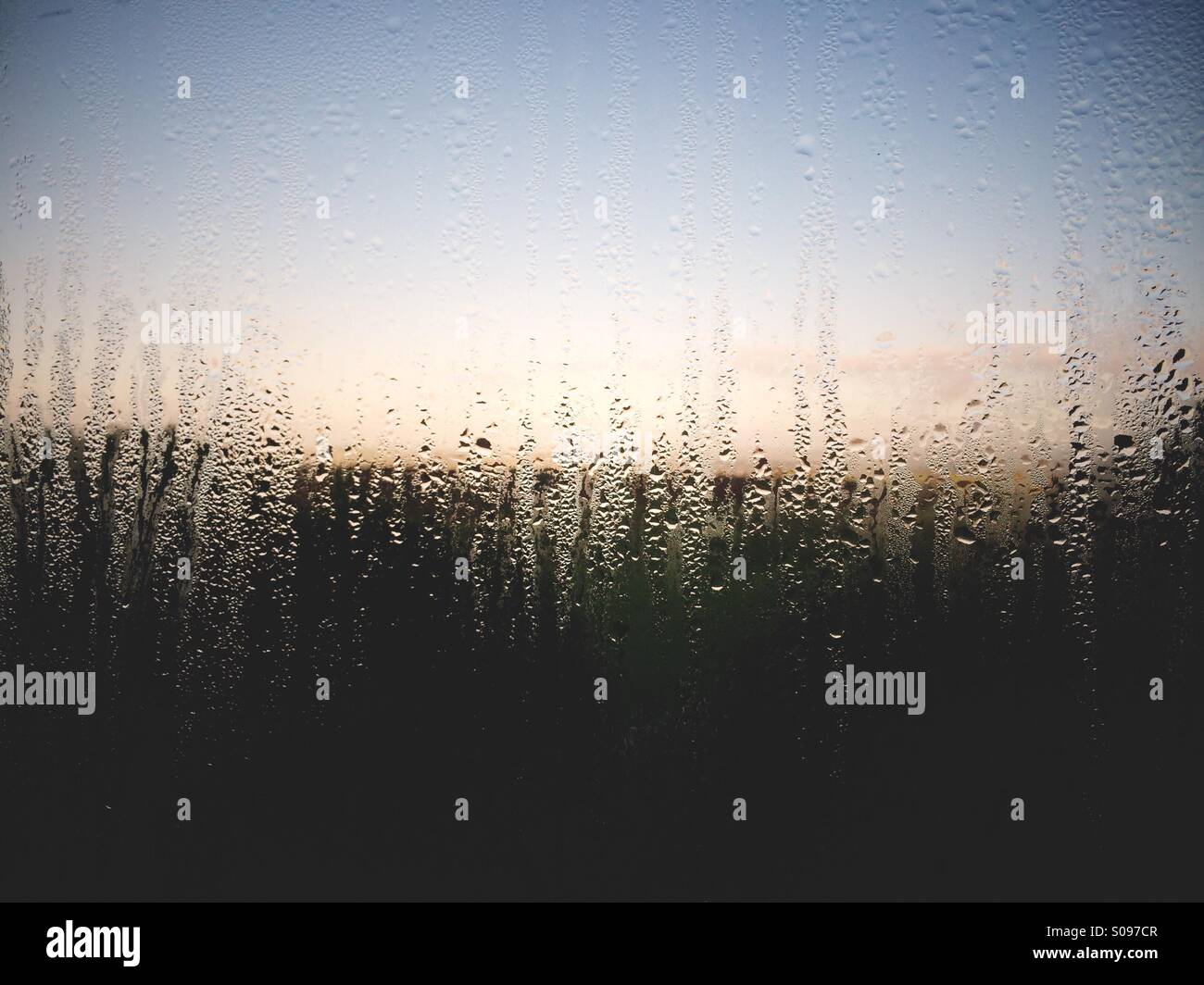 Condensation on the inside of a window in northern England, UK. - Smartphone Captured Stock Image