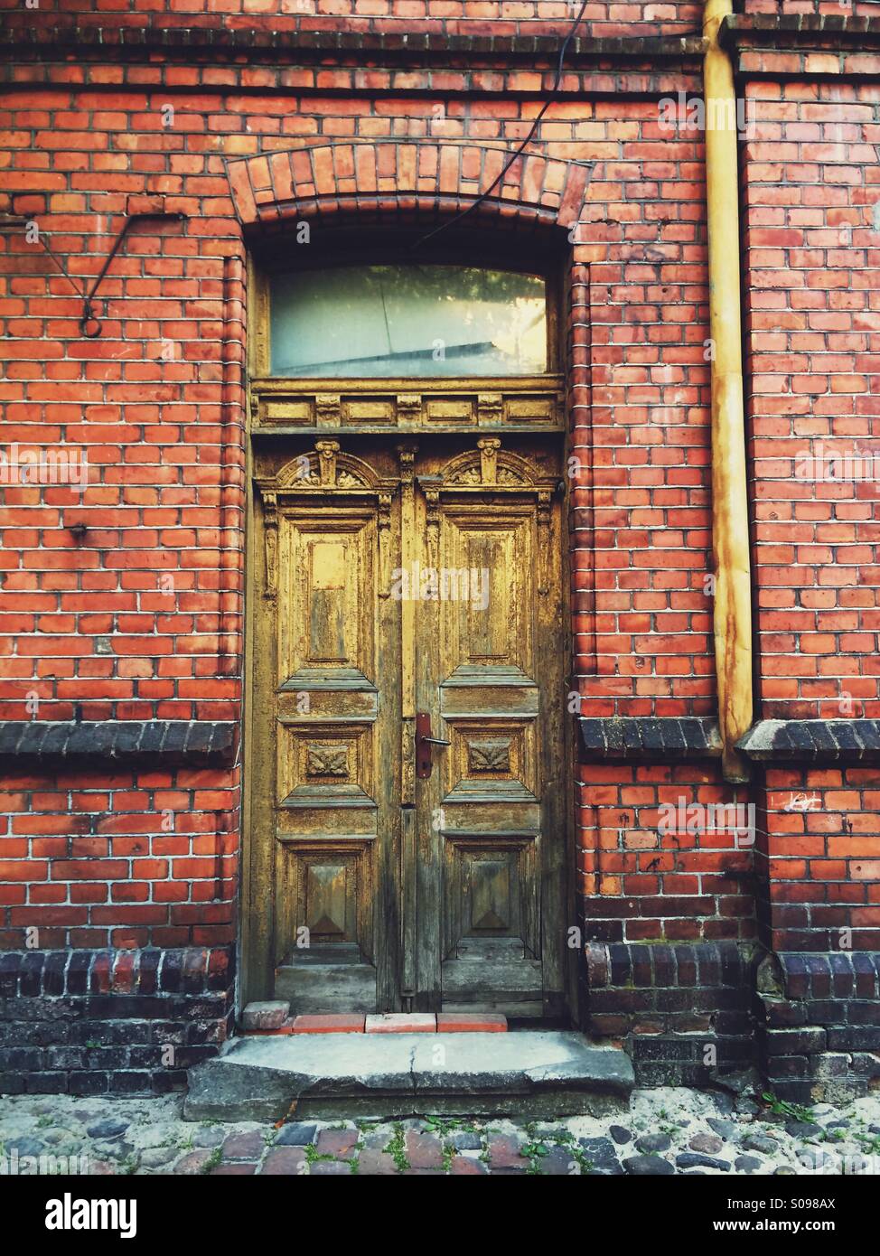 Old Yellow Door And Drainpipe Red Brick Building Liepaja Latvia