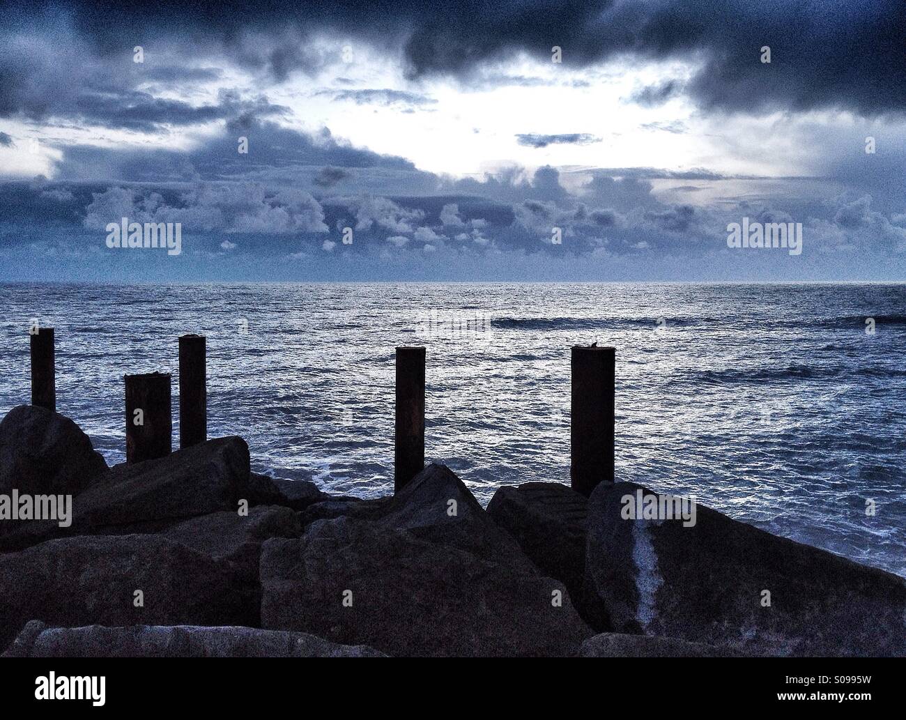 Waiting for the Storm - Sea View at West Bay, Bridport, Dorset Stock Photo