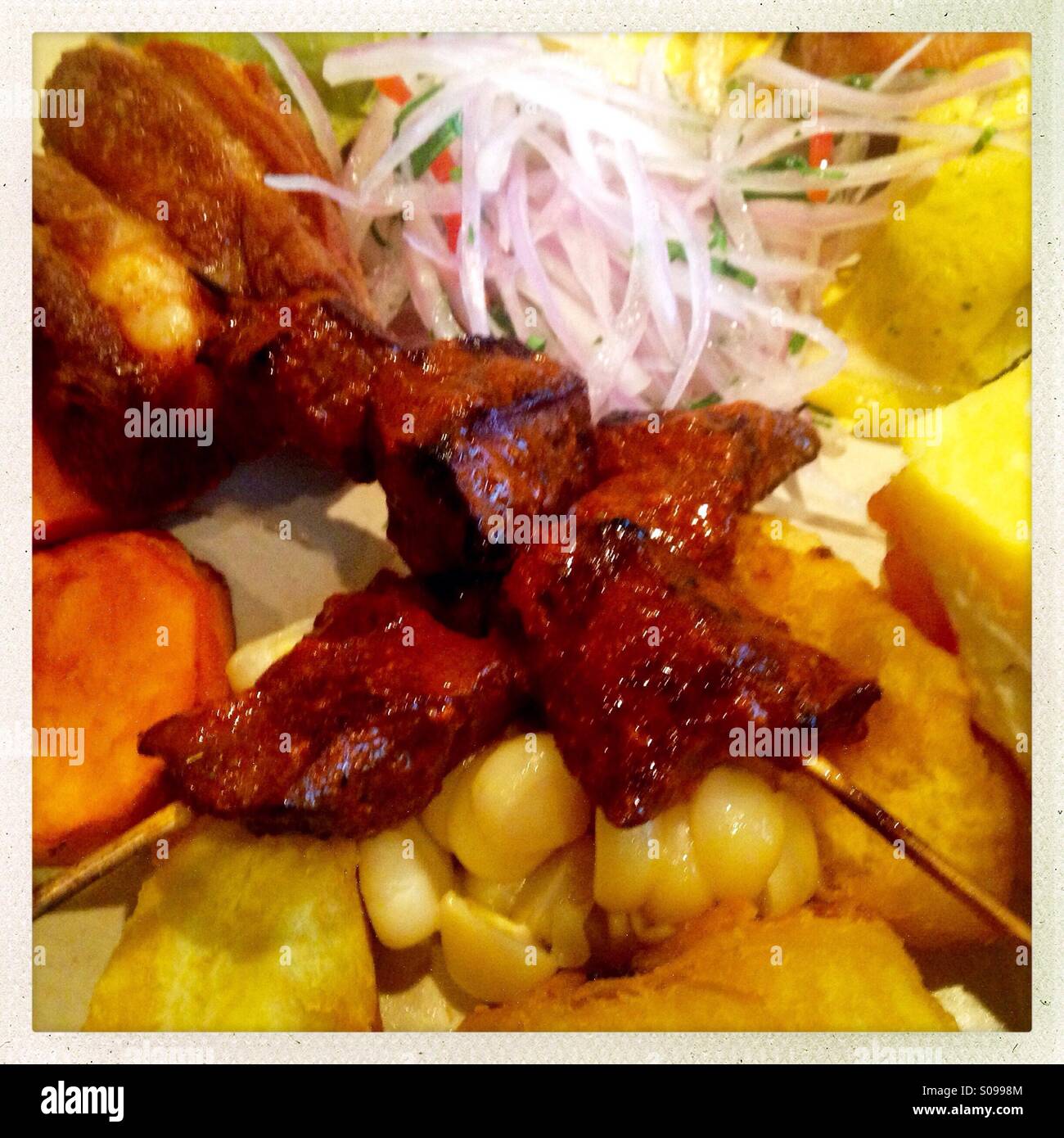 Gourmet Peruvian street food at Gaston Acurio restaurant Panchita - Smartphone Captured Stock Image