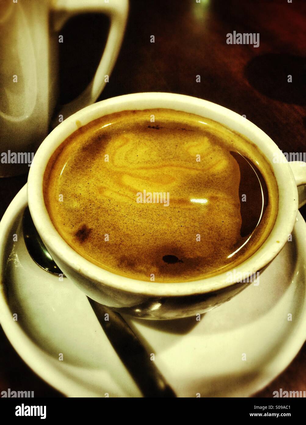 Close up of freshly made cup of coffee - Smartphone Captured Stock Image