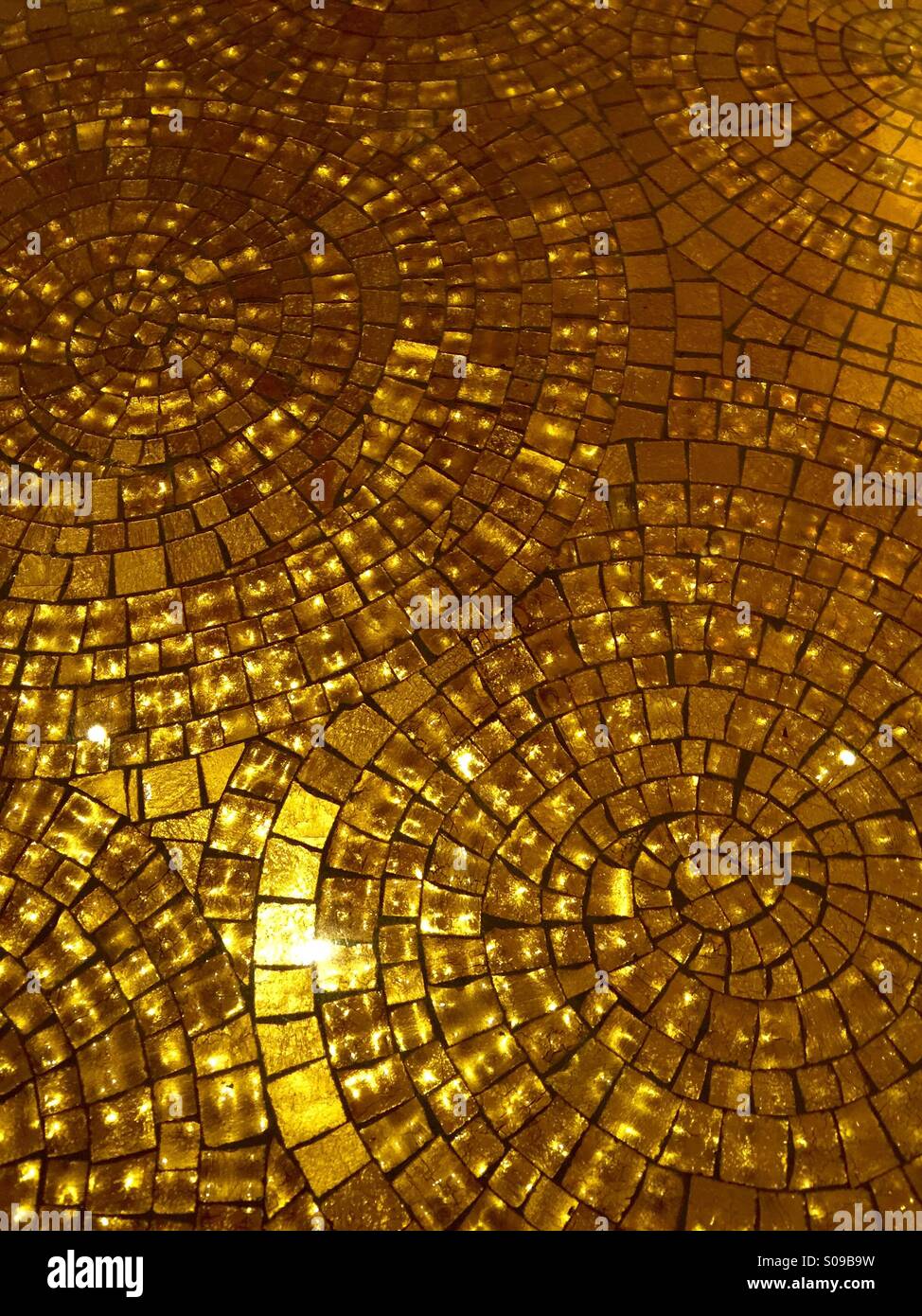 Gold mosaic tile Stock Photo