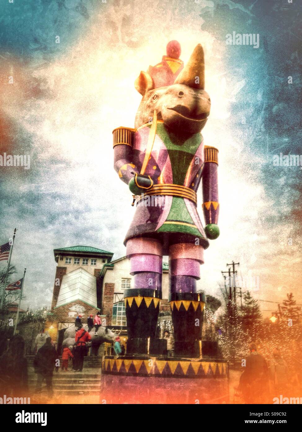 The iconic, giant rhino nutcracker stands guard at the Cincinnati Zoo's Festival of Lights (light leaks). - Smartphone Captured Stock Image