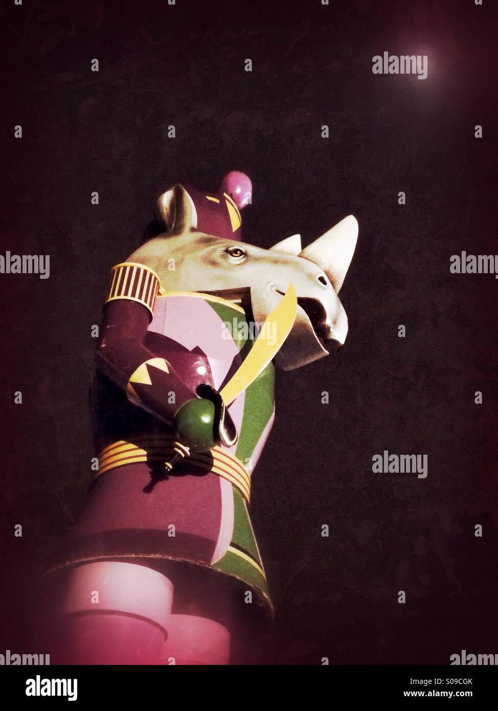 The Cincinnati Zoo's Festival of Lights mascot; the rhinoceros nutcracker with the moon above (pink). - Smartphone Captured Stock Image