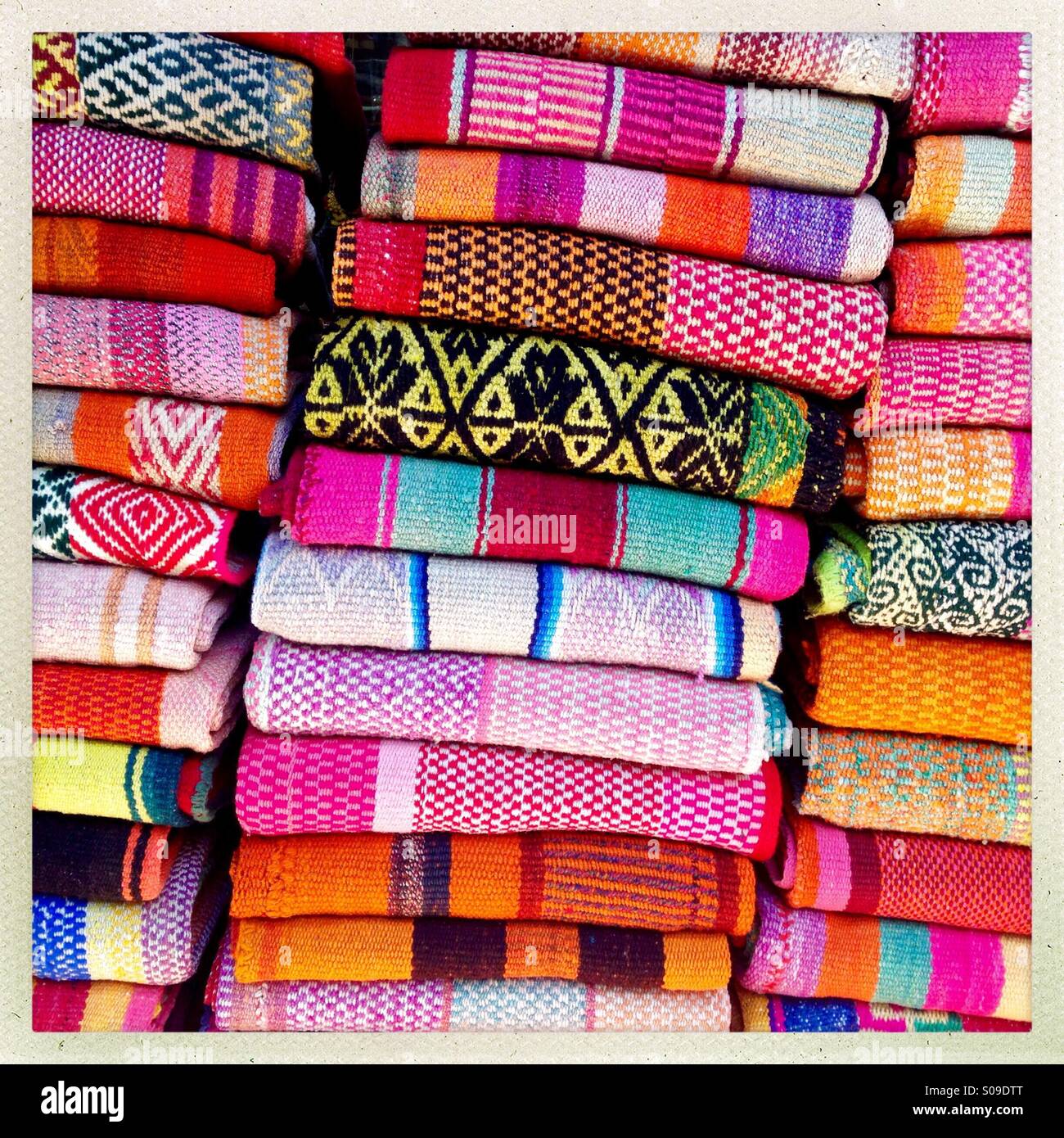 Indian blankets stack up for sale to tourists Stock Photo