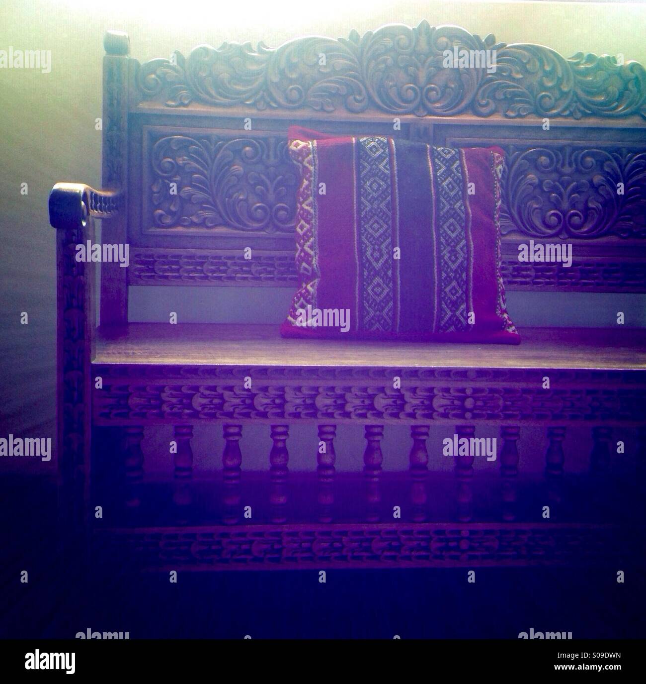 Ornately carved wooden bench - Smartphone Captured Stock Image