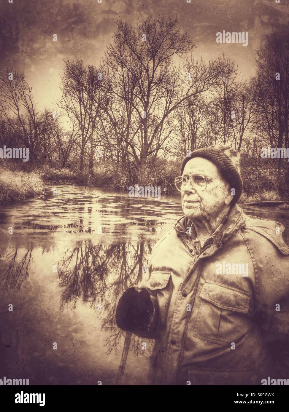 An older man surveying his surroundings (monochromatic). - Smartphone Captured Stock Image