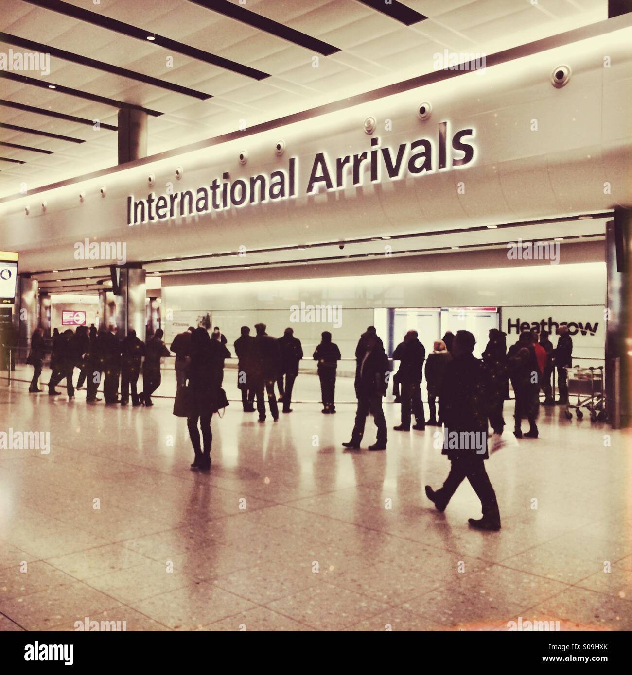 International gate at Heathrow Terminal 2, London UK Stock Photo
