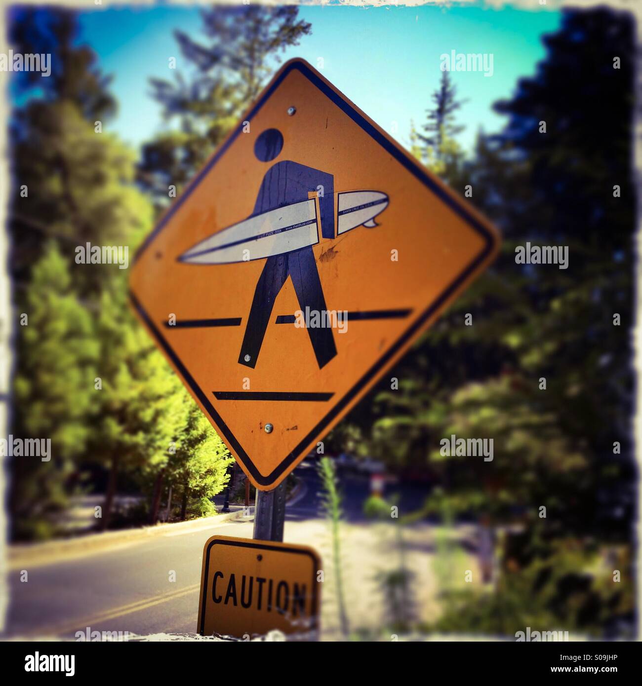 Surfer crossing sign. Santa Cruz County, California, USA Stock Photo