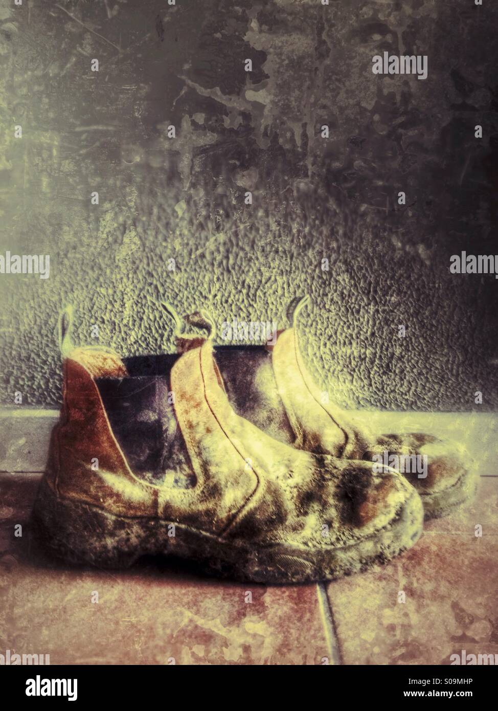 Dirty work boots. - Smartphone Captured Stock Image