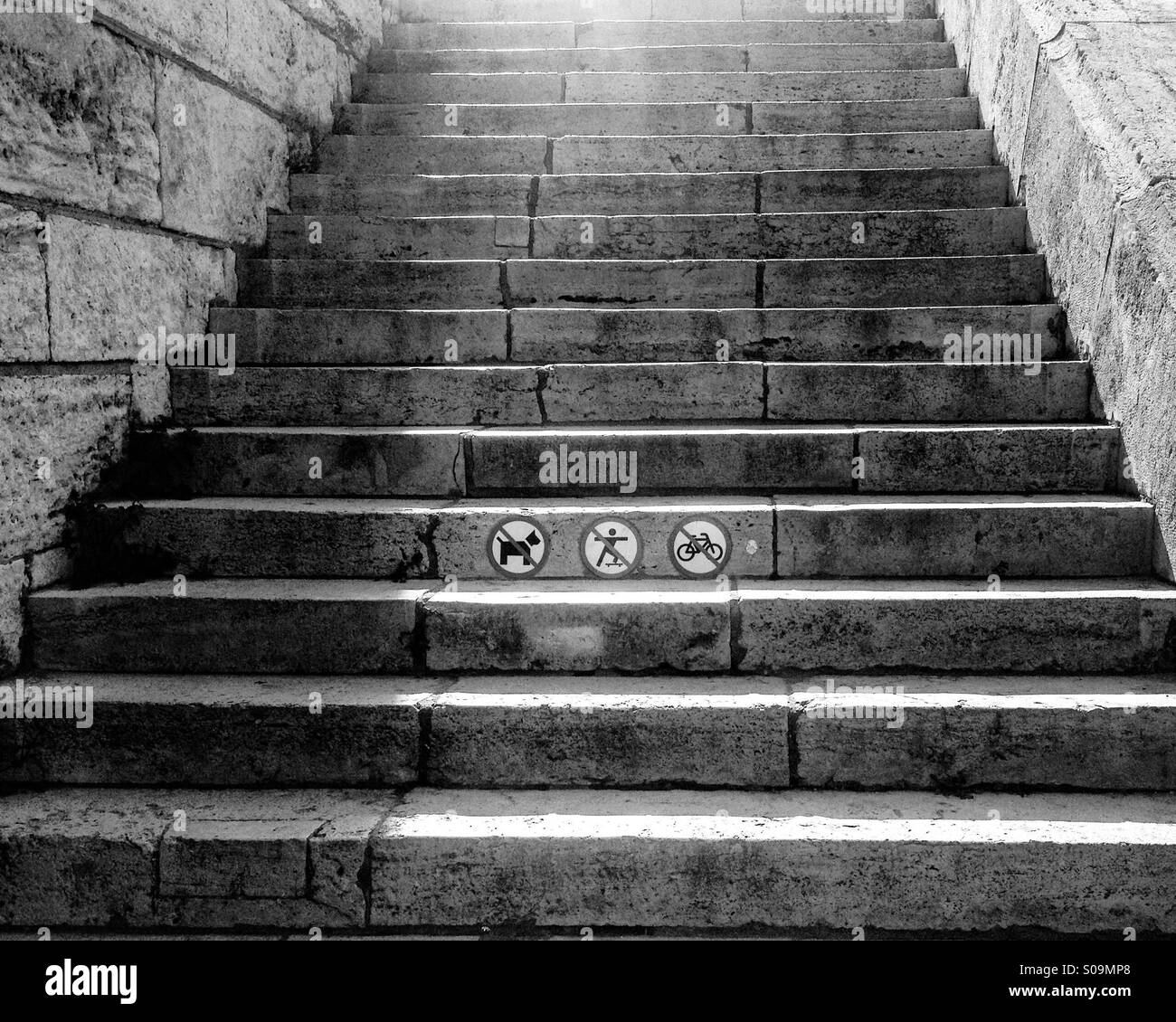 Stone stairs with signs; in black and white. - Smartphone Captured Stock Image