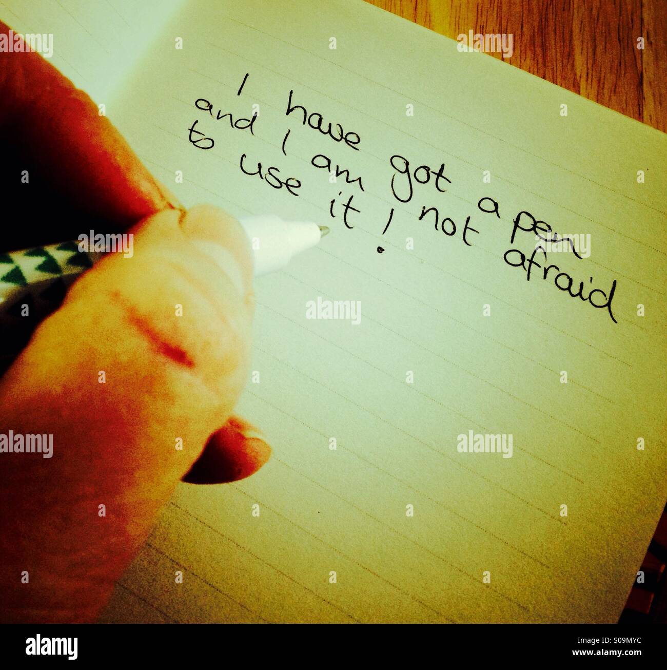 Writing with a pen. - Smartphone Captured Stock Image