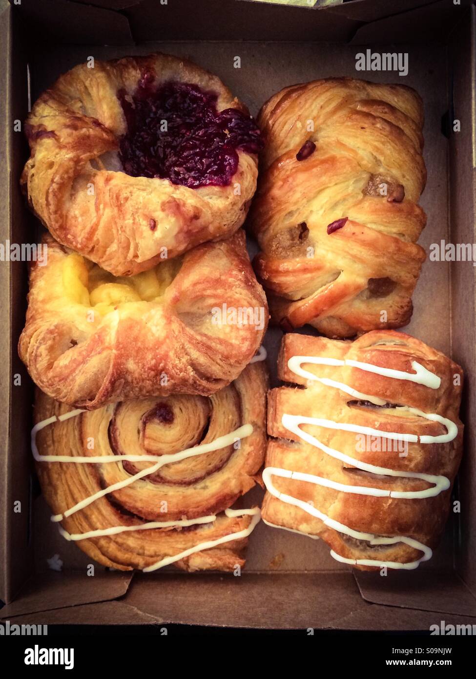 Box of Danish pastries Stock Photo Alamy