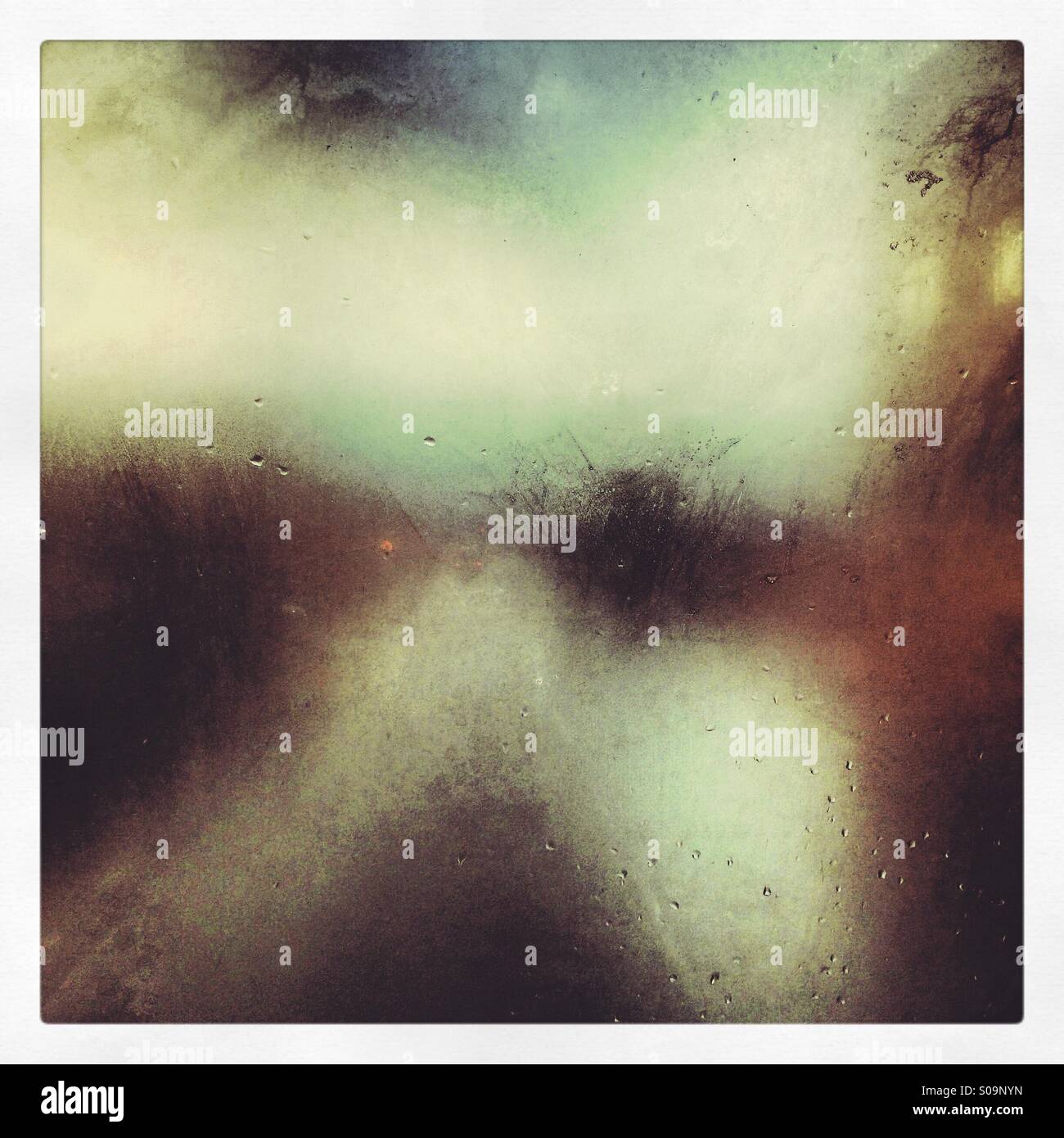 View from the top deck of a London bus on a rainy, stormy day - Smartphone Captured Stock Image